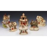 SIX STAFFORDSHIRE POTTERY PASTILLE BURNERS of varying cottage form, 18cm to 13cm h (6)