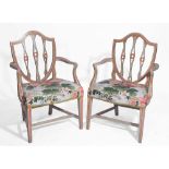 A PAIR OF PAINTED ARMCHAIRS with polychrome floral covers, 58cm w