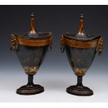 A PAIR OF REGENCY TOLEWARE CHESTNUT URNS AND COVERS with lion head handles and painted decoration on