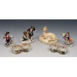 A PAIR OF CONTINENTAL PORCELAIN SALTS with bird decoration, 9cm w; three miniature porcelain