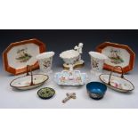 A COLLECTION TO INCLUDE: a pair of porcelain and gilt metal mounted baskets, 22cm h, a pair of