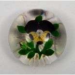 A FRENCH GLASS PAPERWEIGHT with tri-colour pansy decoration, 6.5cm