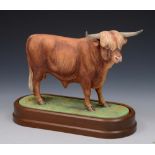 A ROYAL WORCESTER MODEL of a Highland Bull by Doris Lindner 1977 numbered 76, 23.5cm lg on wooden