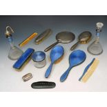 A GERMAN BLUE ENAMELLED DRESSING TABLE SET TO INCLUDE: a hand mirror, hairbrush, clothes brush,