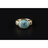 AN OPAL AND DIAMOND THREE STONE RING, the oval cabochon opal collet set between two old-cut