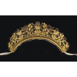 A GEORGIAN GILT METAL TIARA, depicting a frieze of classical motifs, incorporating flowerheads,