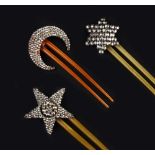 THREE CUT STEEL AIGRETTES, depicting star and crescent motifs, each with hinged double pin