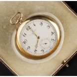 AN 18CT GOLD OPEN FACE POCKET WATCH AND CHAIN, the silvered dial with Arabic numerals and subsidiary