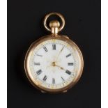 AN OPEN FACE FOB WATCH, the white enamel dial with Roman numerals and gilt foliate decoration, to