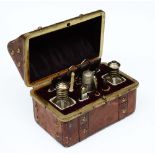 A LATE VICTORIAN LADIES ETUI in the form of a travelling trunk with fitted interior with twin