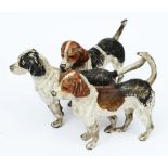 A BERGMAN STYLE BRONZE COLD PAINTED SCULPTURE of a pack of hounds, 7cm high