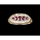 A RUBY AND DIAMOND DRESS RING, centred with five graduated oval mixed-cut rubies, framed by old