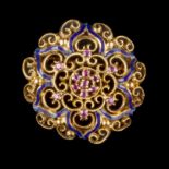 A RUBY AND ENAMEL PANEL BROOCH, of openwork rosette design, centred with a cluster of circular