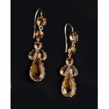 A PAIR OF CITRINE EAR PENDANTS, each suspending a trio of pear-shaped citrines, below a circular-cut