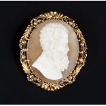 A MID-19TH CENTURY SHELL CAMEO BROOCH, carved to depict the profile of a distinguished bearded