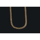 AN 18CT GOLD CHAIN, of stylised curb-link design, the clasp with Birmingham import marks, length