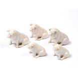 A FAMILY OF FIVE BELLEEK PORCELAIN PIGS in seated position, largest 7cm high (5)