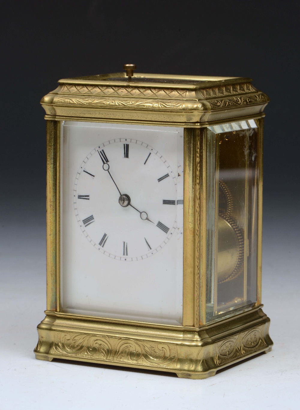 A 19TH CENTURY FRENCH CARRIAGE CLOCK with white enamel Roman dial breguet style open moon hands,