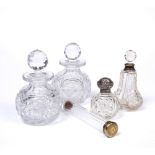 A PAIR OF HOBNAIL GLASS SCENT BOTTLES AND STOPPERS with star bases, 14.5cm high; two silver