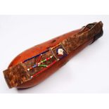AN EAST AFRICAN MASAI TRIBE GOURD CONTAINER with ostrich shell and coloured bead ornament 40cm