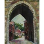 20TH CENTURY SCHOOL A street viewed through a stone archway, oil on canvas, 50.5 x 40.5cm