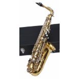 A SAXOPHONE titled 'The Horn' and numbered A871077 in fitted case; together with assorted music