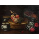 SPANISH SCHOOL A chaffinch perched upon peaches, on a stand surrounded by fruit, flowers and