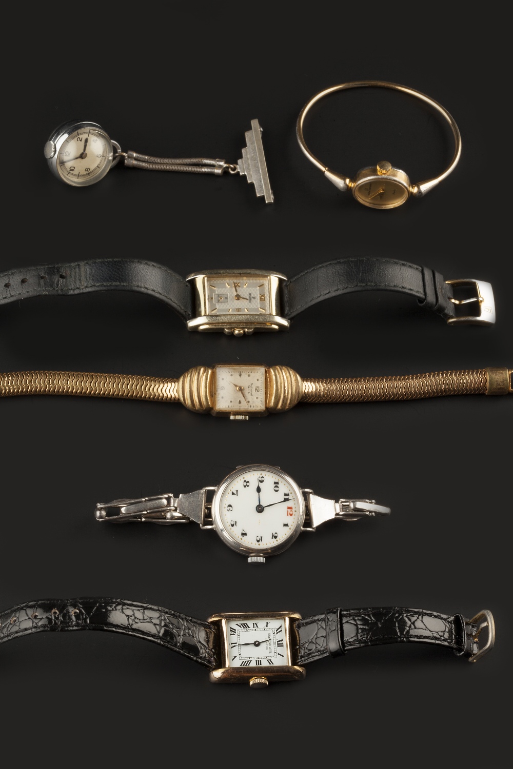 A COLLECTION OF LADY'S WATCHES, comprising a gilt metal wristwatch by Raymond Weil, the signed