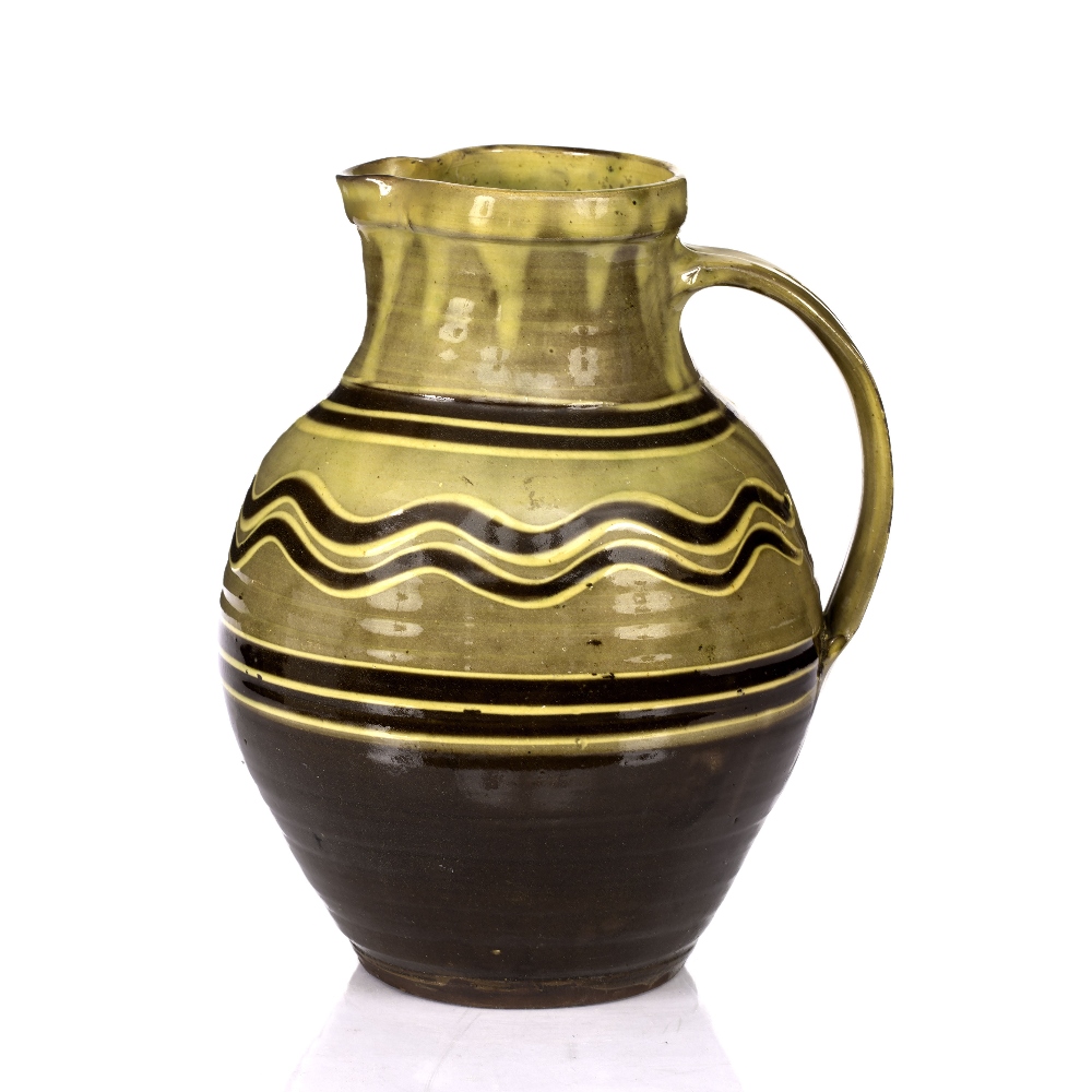 Ray Finch (1914-2012) at Winchcombe Pottery Jug slip decoration impressed potter's seal 30cm high.