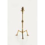 Manner of W.A.S. Benson (1854-1924) Table lamp, circa 1900 brass articulated stem, tripod base 36.