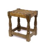 Robert Thompson (1876-1955) of Kilburn Mouseman stool oak, with woven tan leather top carved mouse