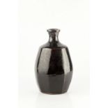 Trevor Corser (1938-2015) at Leach Pottery Vase tenmoku glaze, faceted sides impressed potter's