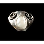 Murrle Bennett & Co. Panel brooch shield-shaped hammered and pierced form with central blister pearl