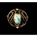 Murrle Bennett & Co. Panel brooch sinuous openwork form centred with an oval cabochon turquoise