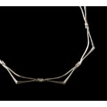 Tone Vigeland (Norwegian, b.1938) Silver collar necklace repeating openwork triangular panels signed
