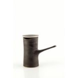 Lucie Rie (1902-1995) Coffee Pot manganese glaze impressed potter's seal 19cm high. Provenance: