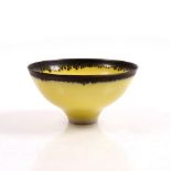 Peter Wills (Contemporary) Bowl yellow glaze with dripped manganese rim signed 12.3cm diameter.