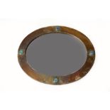 Attributed to Liberty & Co. Wall mirror brass frame, inset turquoise Ruskin roundels 53cm x 64cm.