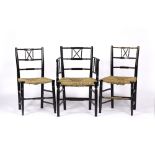 Manner of Ford Madox Brown for Morris & Co. Set of four Arts & Crafts chairs ebonised and with