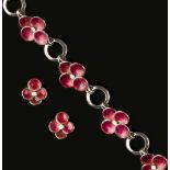 Bernard Instone (British, 1891-1987) Bracelet and ear clips suite with pink and white enamel four-