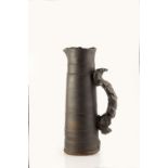Colin Pearson (1923-2007) Jug form bronze glaze impressed potter's seal 40.5cm high.