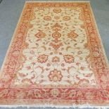 A Ziegler carpet, with all over foliate designs, on a cream ground,