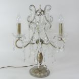 A glass six branch table centrepiece, 55cm tall,
