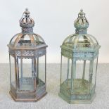 A pair of Morroccan style metal and glass lanterns,