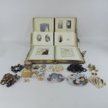 A collection of coins and watches,