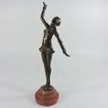 A bronzed figure of a dancer,