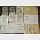 A collection of stamps and stamp albums