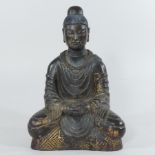 A bronzed figure of a Buddha,