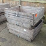 A set of three large wooden apple crates,