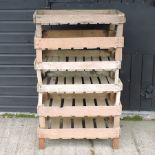 A set of six wooden apple crates,